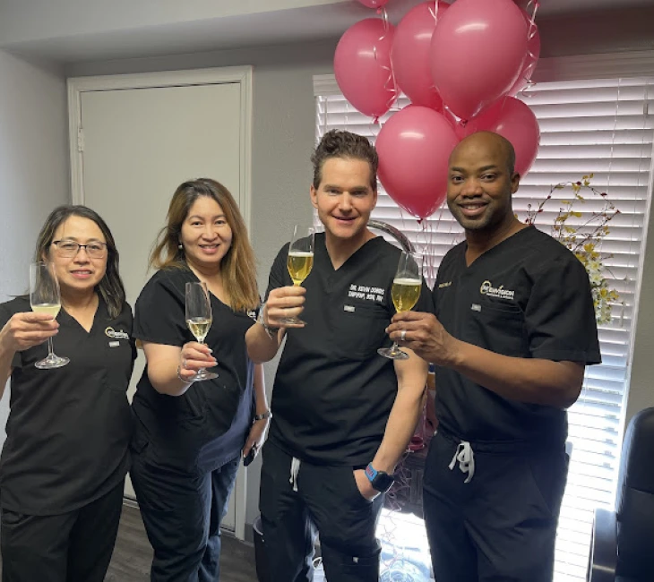 ReEnvision Aesthetics and MedSpa Team Celeberating Banner